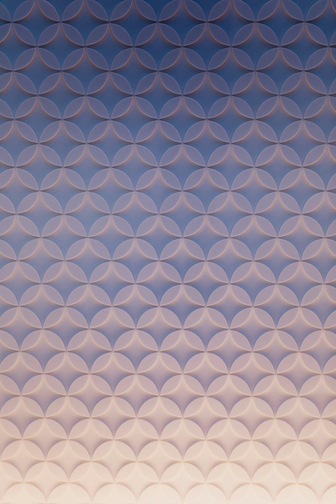 Mur en relief à motif circulaire, dégradé bleu et rose